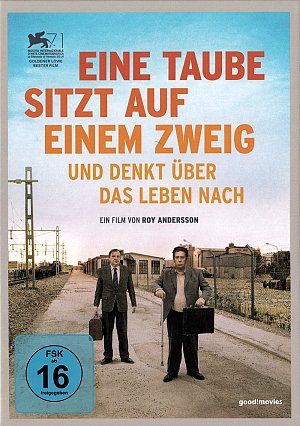 Eine Taube sitzt auf einem Zweig und denkt über das...